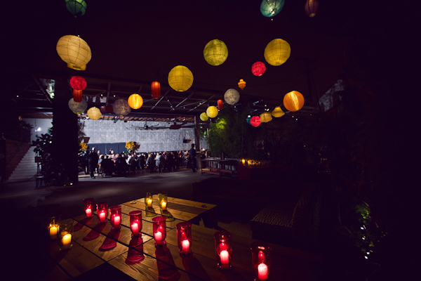 outdoor ceremony/reception site with paper lanterns and colorful candles - vintage LA wedding at The Smog Shoppe photo by top Orange County wedding photographer Duke Images